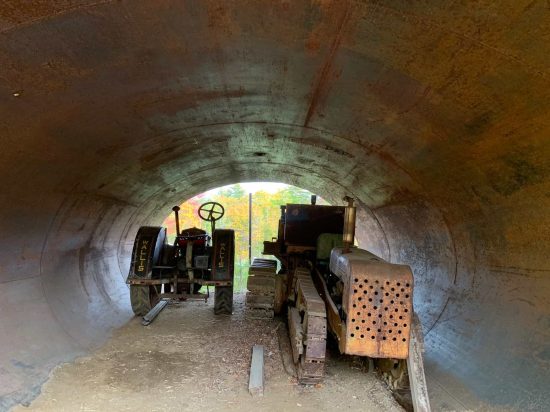 Antique tractors in a tube